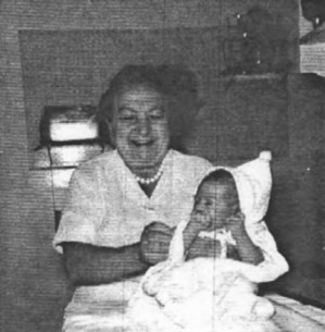 Baby Mark Alan born May 9, 1954 One week old in Flushing with his baby nurse, our aunt Betty Stamm